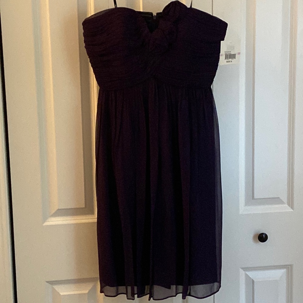 Donna Morgan. Size 6. NWT. Color: Amethyst. Silk.